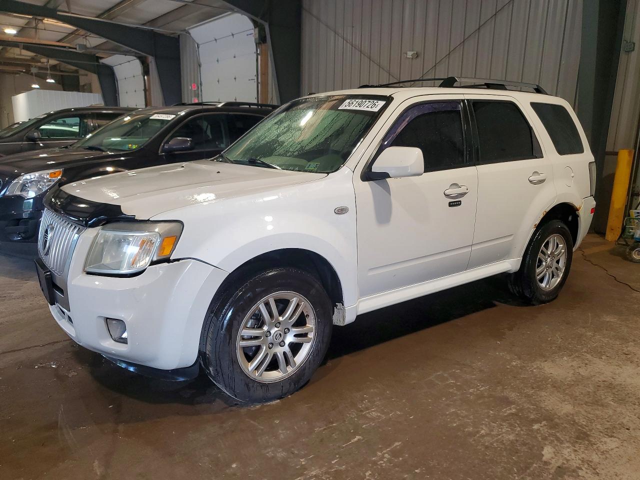 2009 Mercury Mariner Premier, VIN 4M2CU87G39KJ06117 — Бок