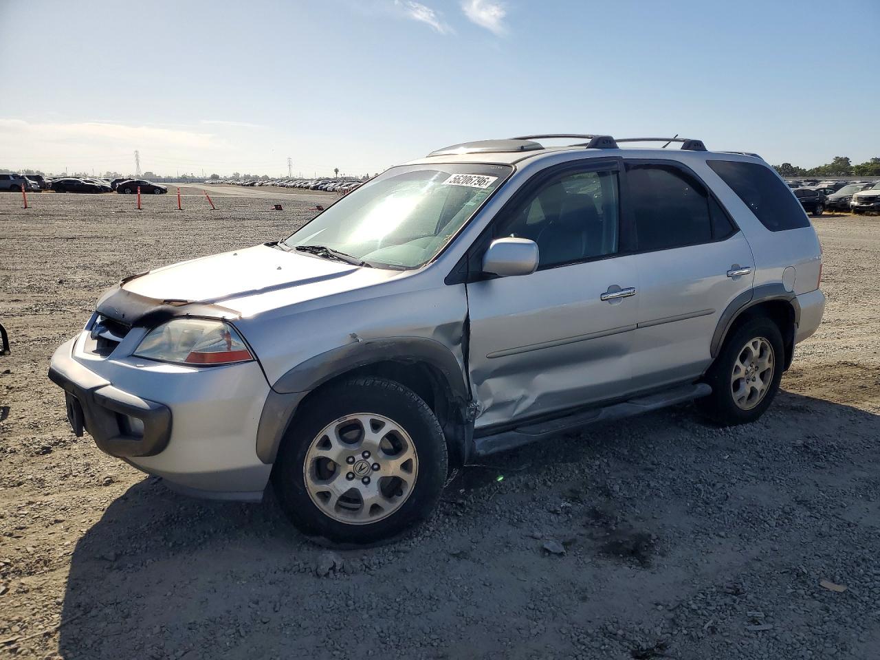 2001 Acura MDX Touring, VIN 2HNYD18871H510943 — Side