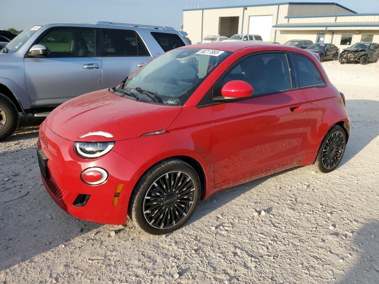 2024 FIAT 500e INSPI(RED), VIN ZFAFFAA43RX204819 — Hail
