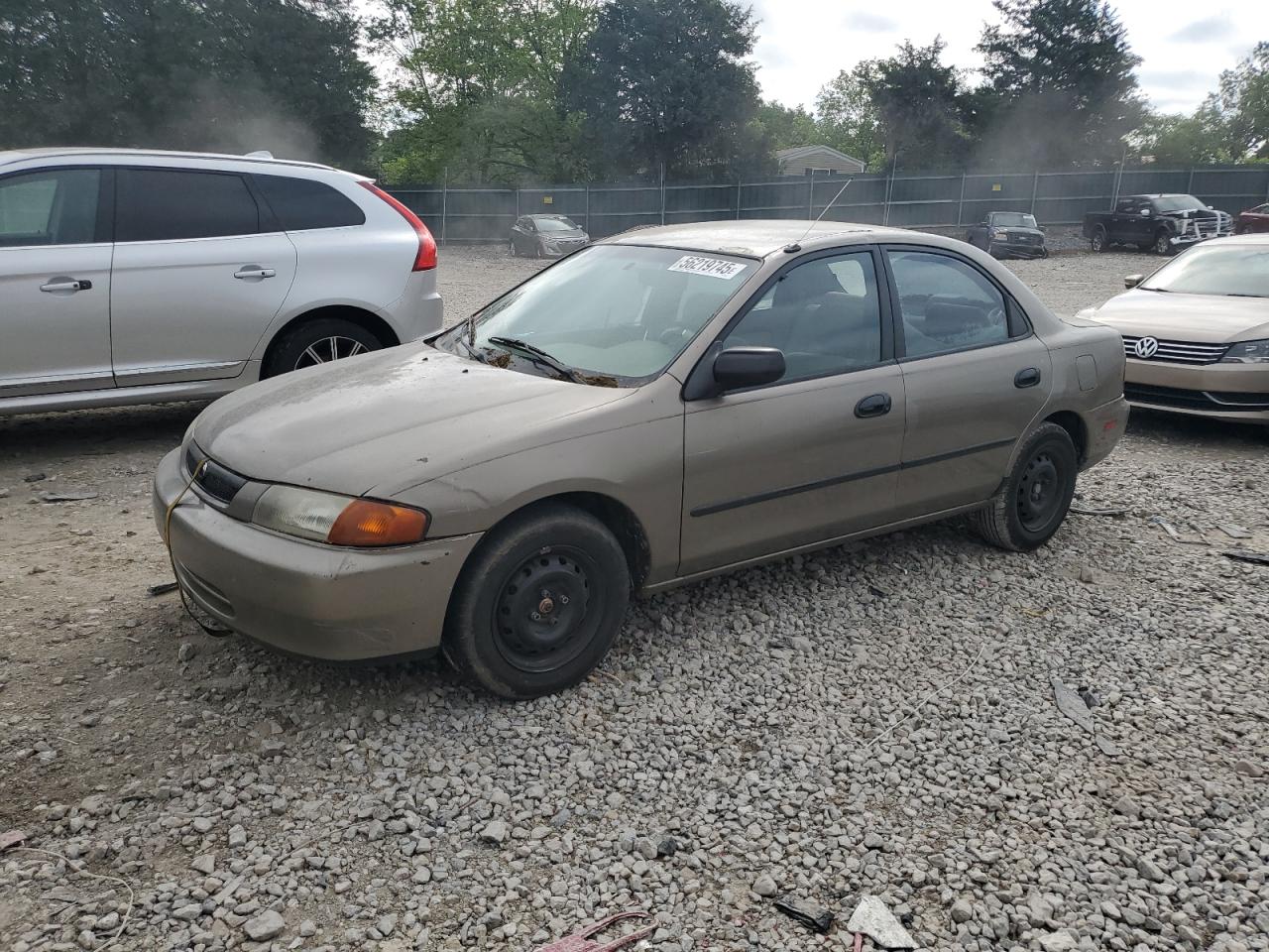 1997 Mazda Protege DX, VIN JM1BC1414V0103244 — Бок