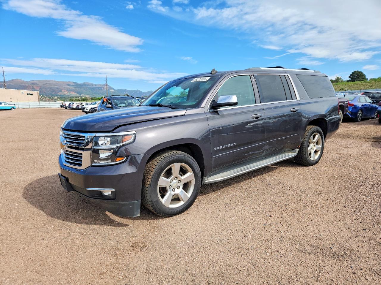 2015 Chevrolet Suburban LTZ, VIN 1GNSKKKC7FR243998 — Side