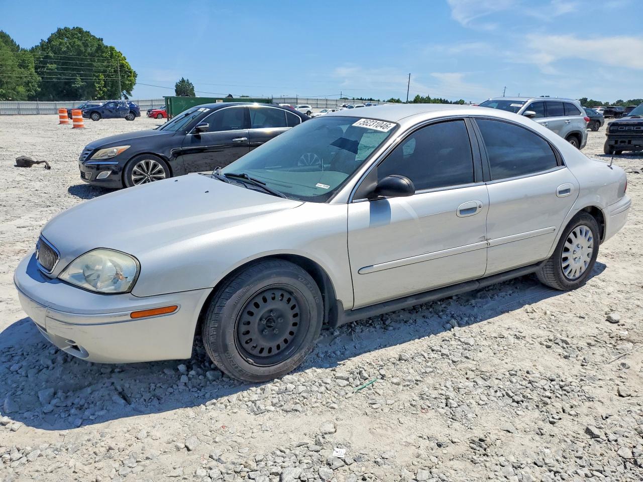 2005 Mercury Sable GS, VIN 1MEFM50U75A616745 — Бок