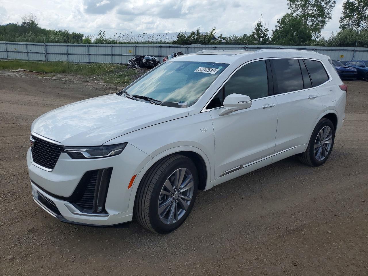 2025 Cadillac XT6 FWD Premium Luxury, VIN 1GYKPCRS8SZ122849 — Hail
