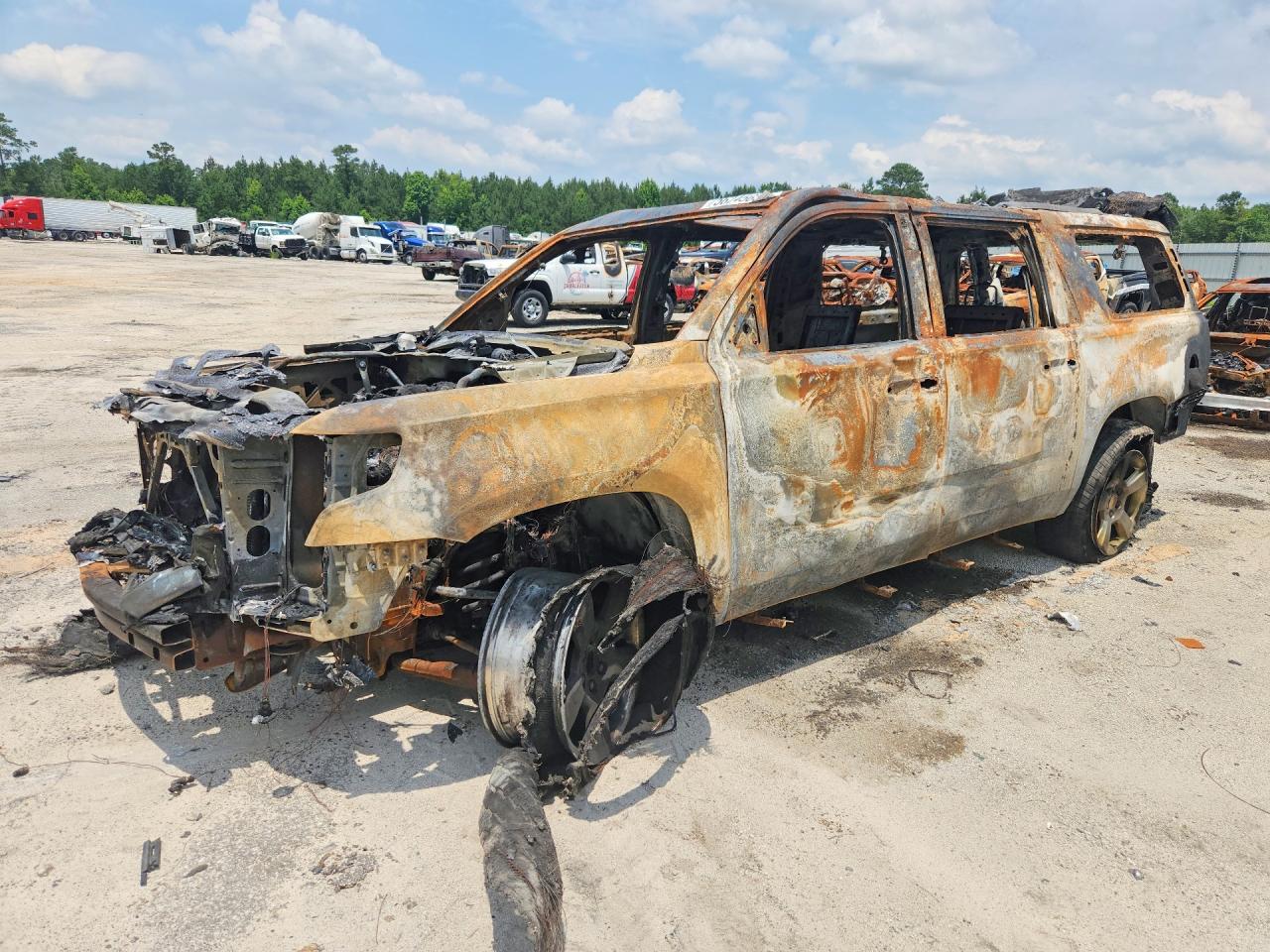 2018 Chevrolet Suburban LT, VIN 1GNSKHKCXJR351821 — Burn