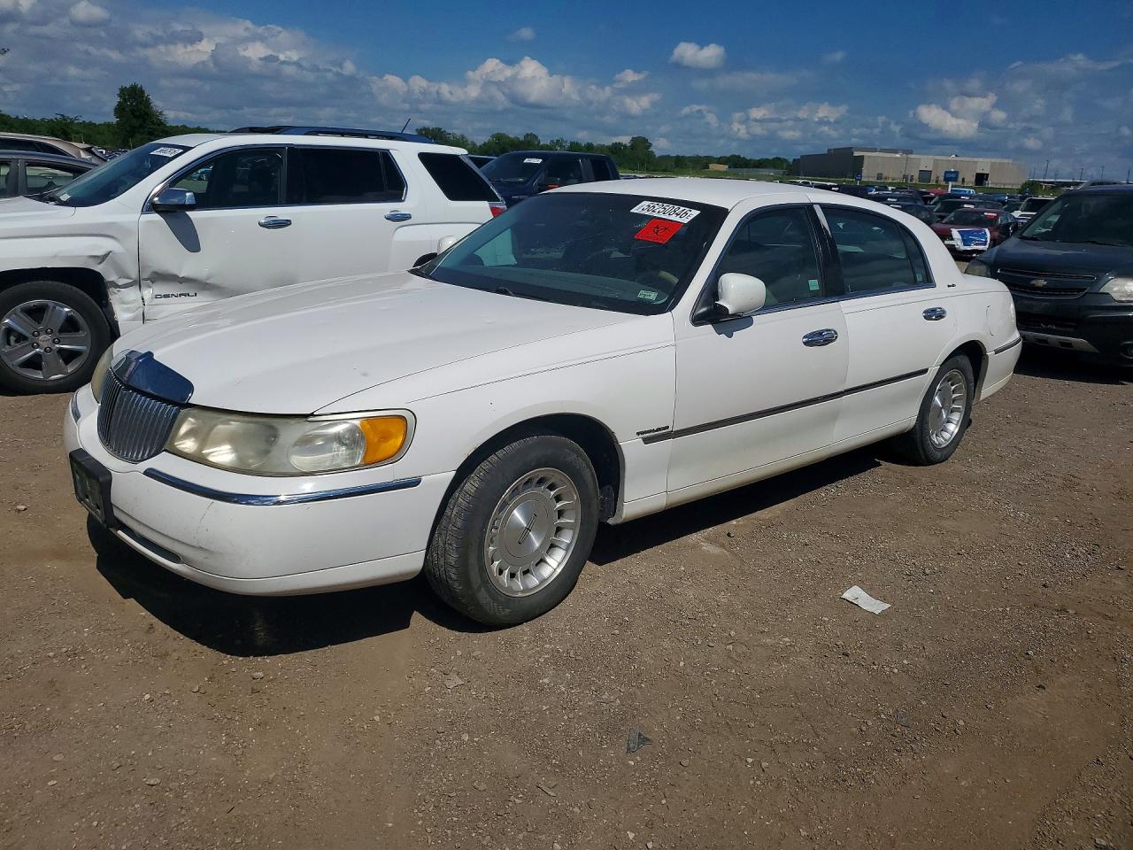 1998 Lincoln Town Car Executive, VIN 1LNFM81W5WY663487 — Hail