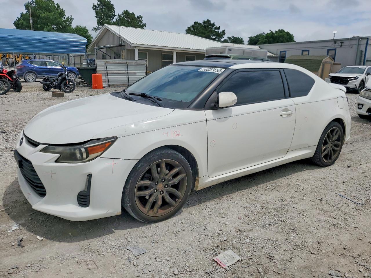2014 Scion tC, VIN JTKJF5C72E3078299 — Side