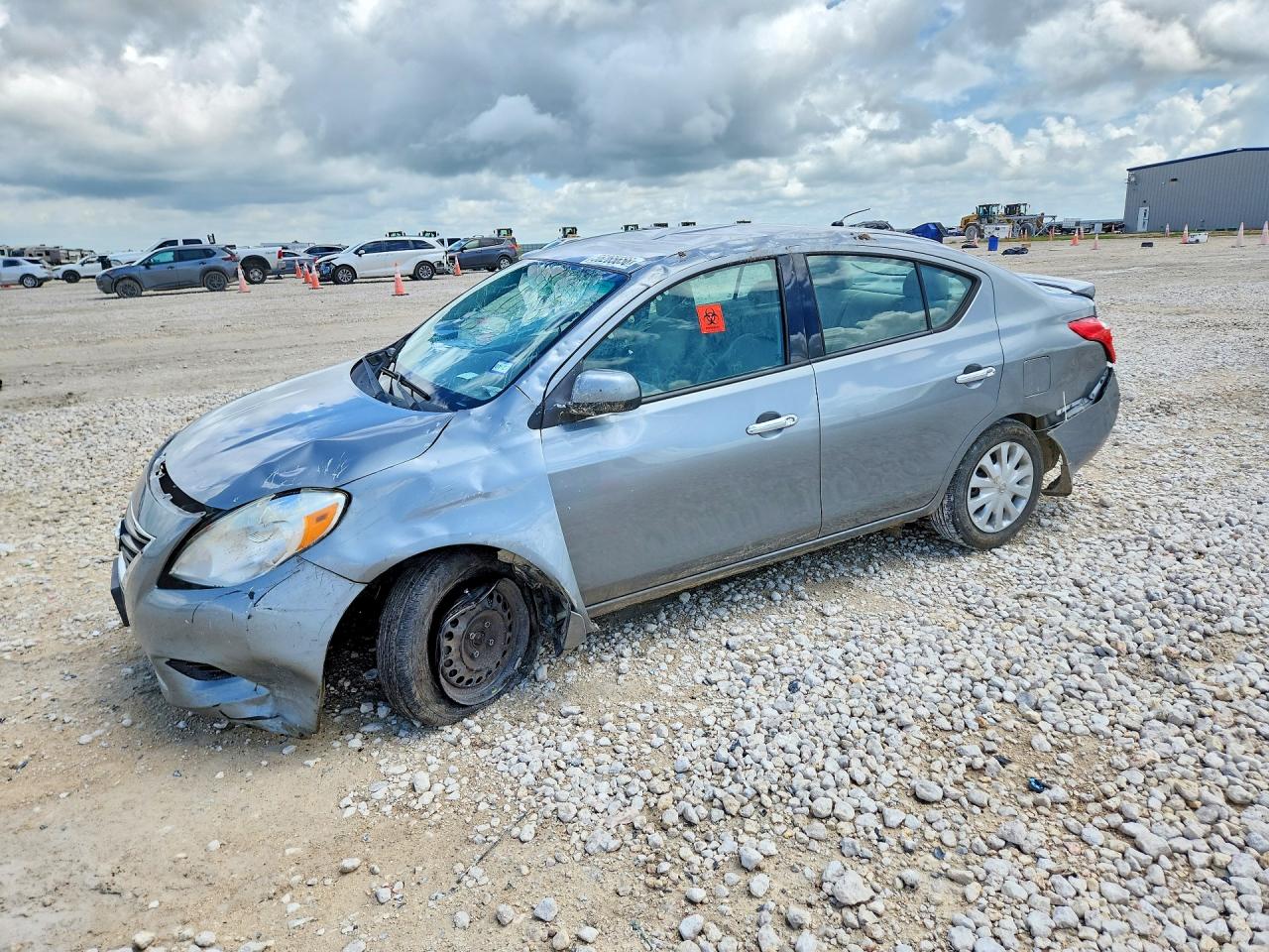 2014 Nissan Versa SV, VIN 3N1CN7AP6EL801001 — Rollover