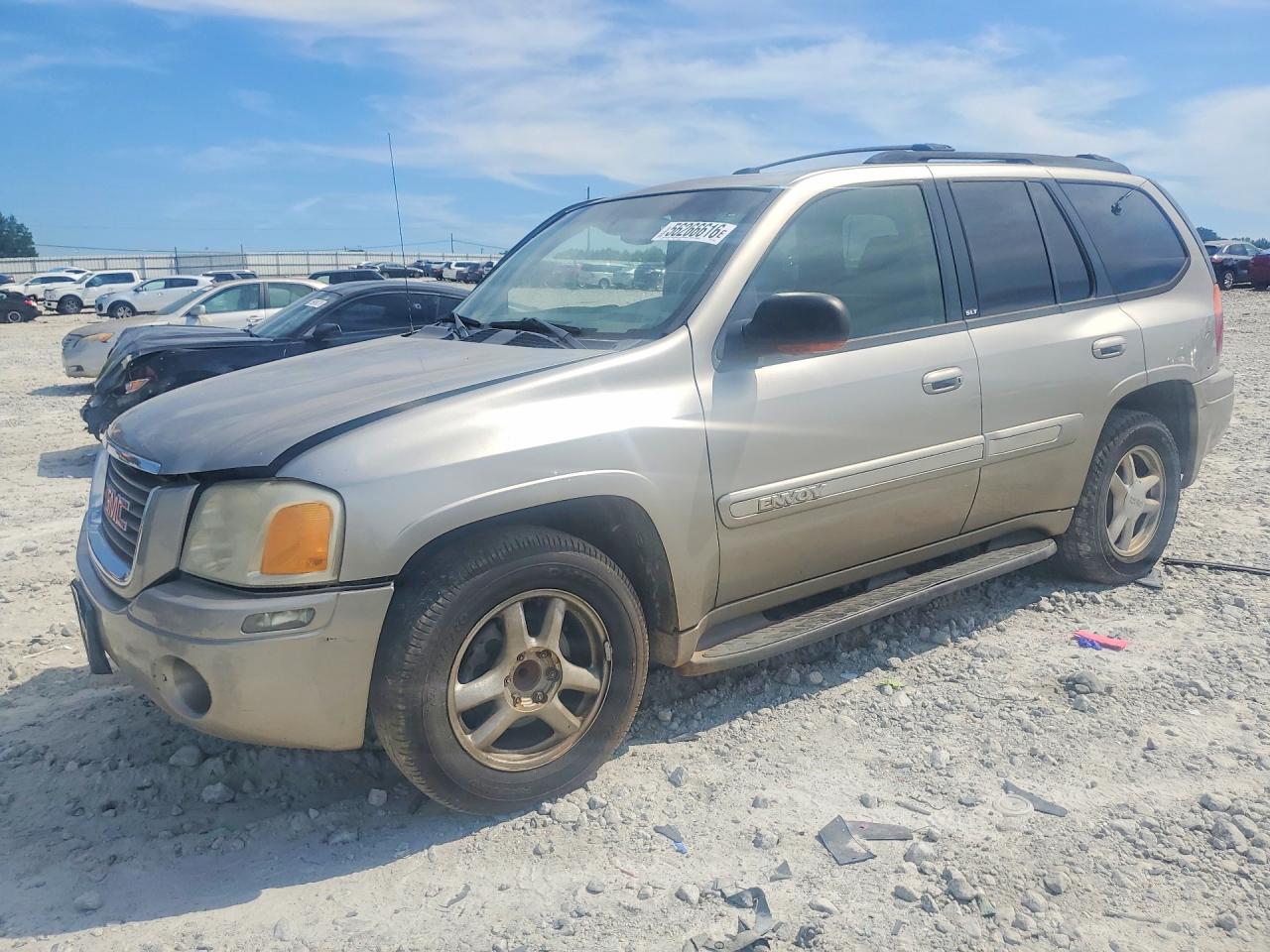 2003 GMC Envoy SLT, VIN 1GKDS13S232237875 — Side