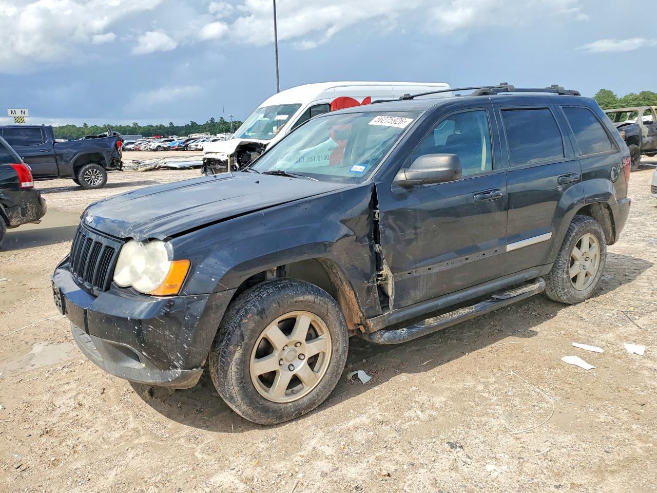 2010 Jeep Grand Cherokee Laredo, VIN 1J4PR4GK8AC147874 — Side