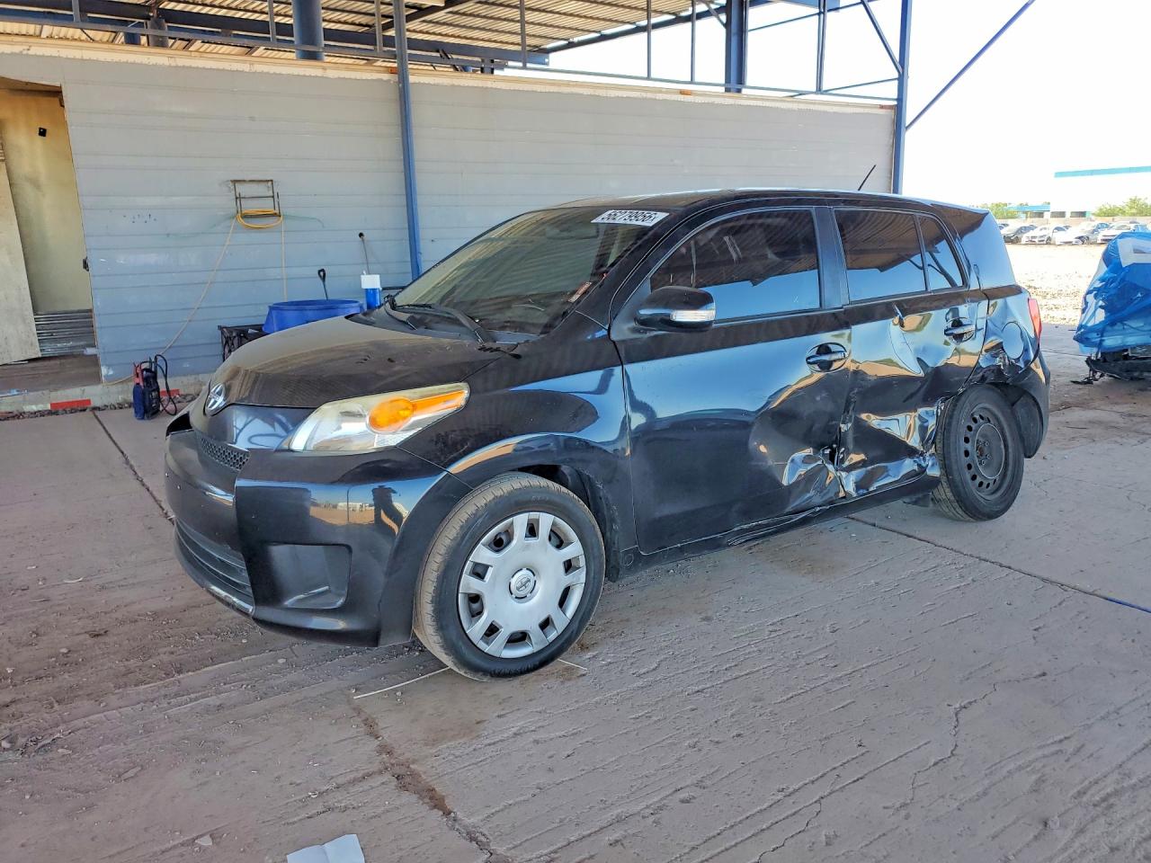 2012 Scion xD, VIN JTKKU4B41C1025291 — Side