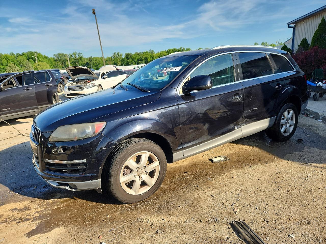 2011 Audi Q7 Premium, VIN WA1CGAFE2BD002467 — Side