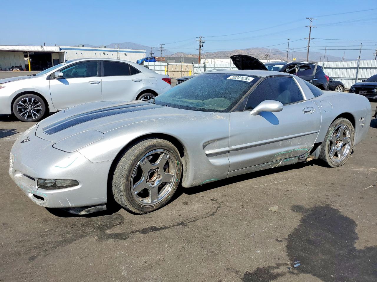 1999 Chevrolet Corvette, VIN 1G1YY22G8X5101875 — Side