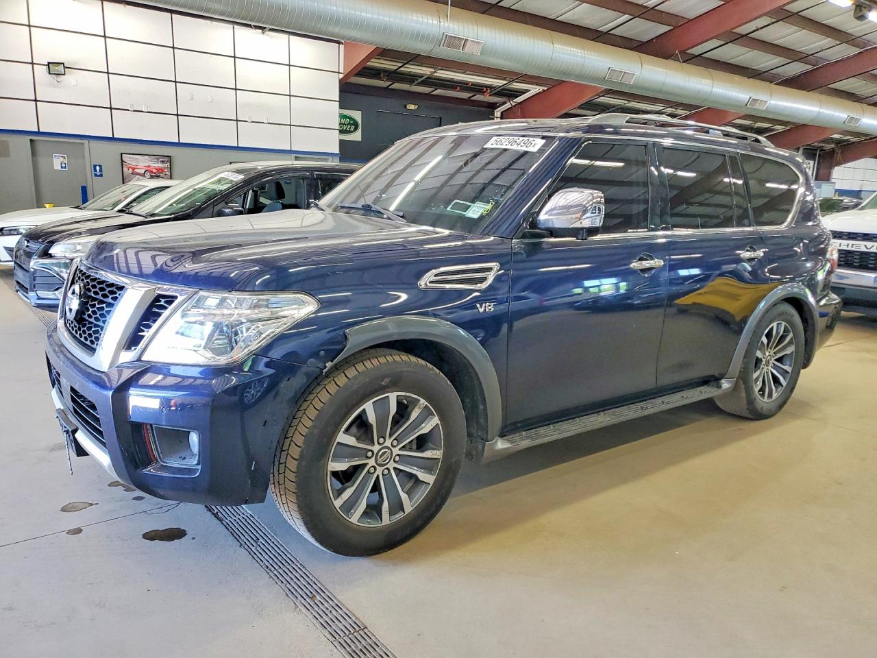 2017 Nissan Armada SV, VIN JN8AY2NC7H9500471 — Side