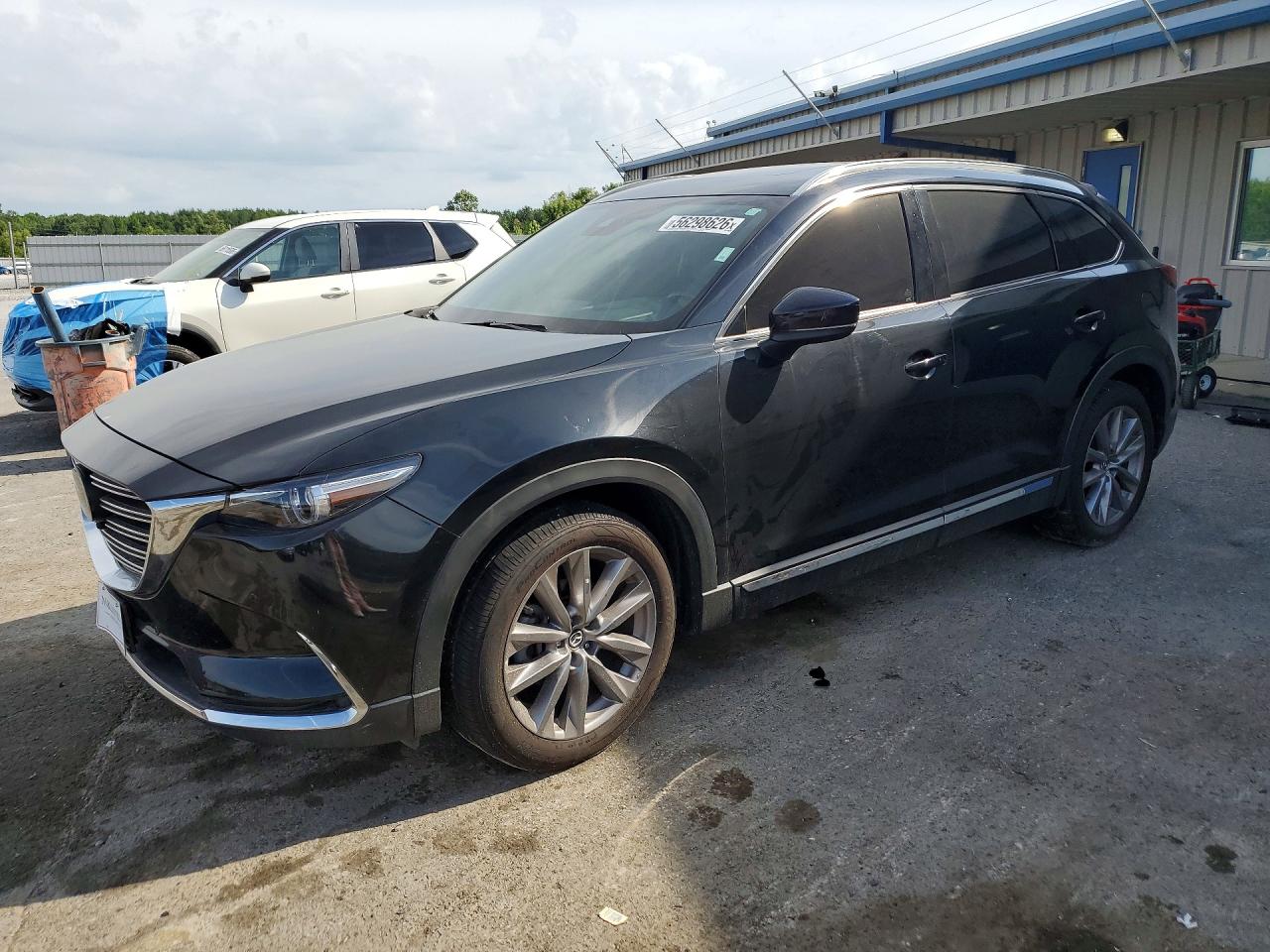 2021 Mazda CX-9 Grand Touring, VIN JM3TCBDY7M0533394 — Side