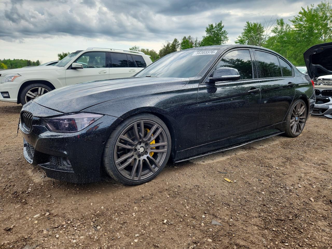 2018 BMW 3 Series 340i xDrive, VIN WBA8B7C56JA576553 — Бок