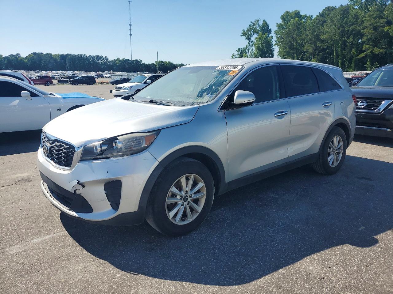2019 Kia Sorento LX, VIN 5XYPG4A30KG577599 — Side