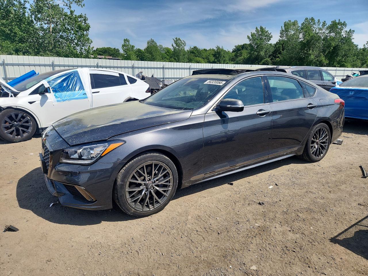 2019 Genesis G80 3.8L, VIN KMTFN4JE2KU313240 — Side
