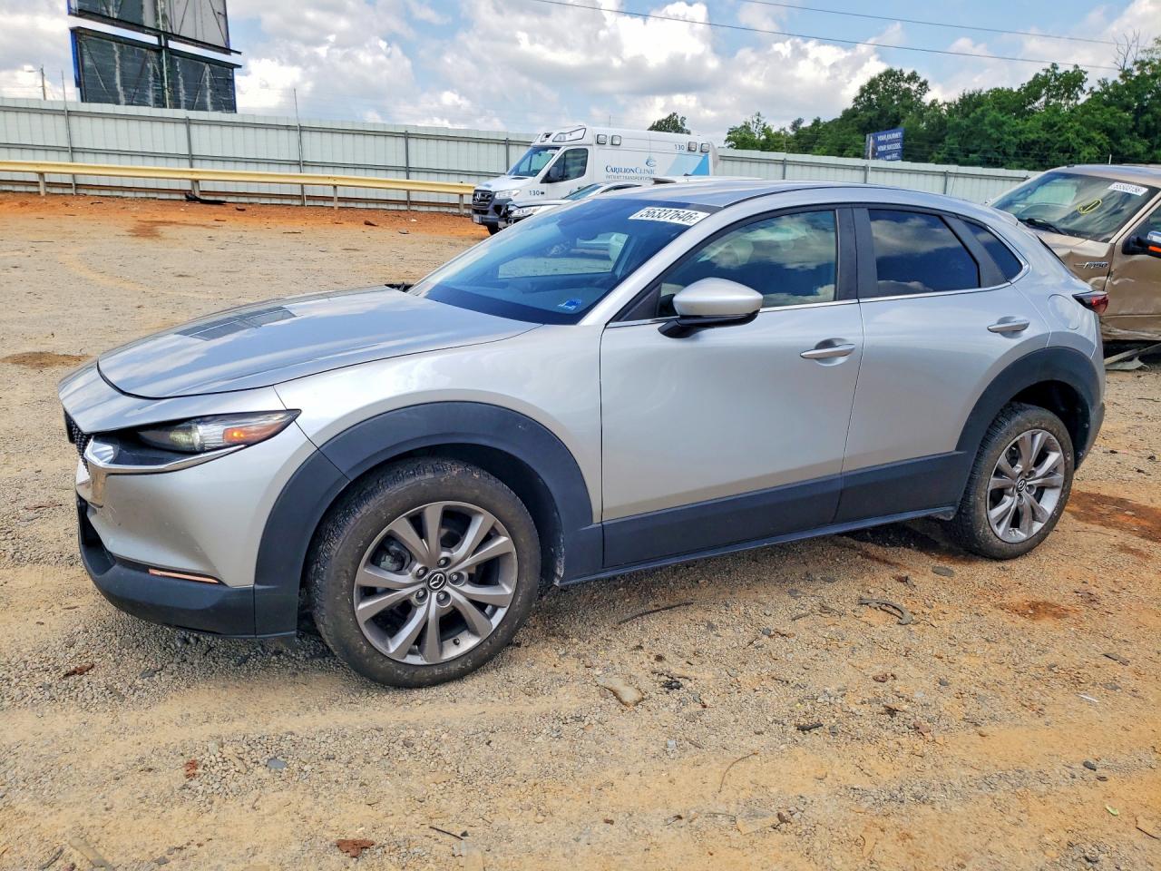 2021 Mazda CX-30 Select, VIN 3MVDMBBL3MM246616 — Side