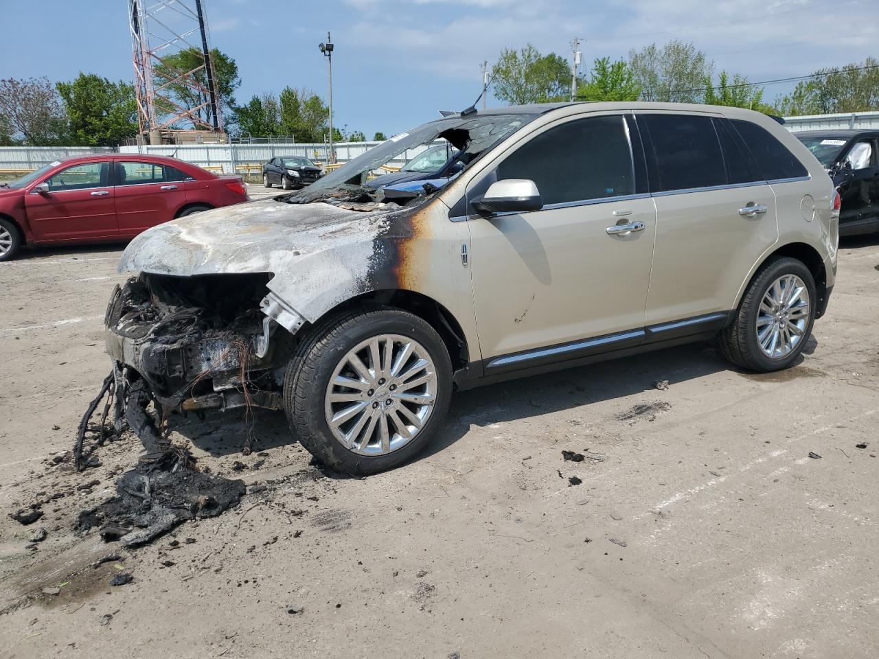 2011 Lincoln MKX, VIN 2LMDJ6JK3BBJ28851 — Engine fire