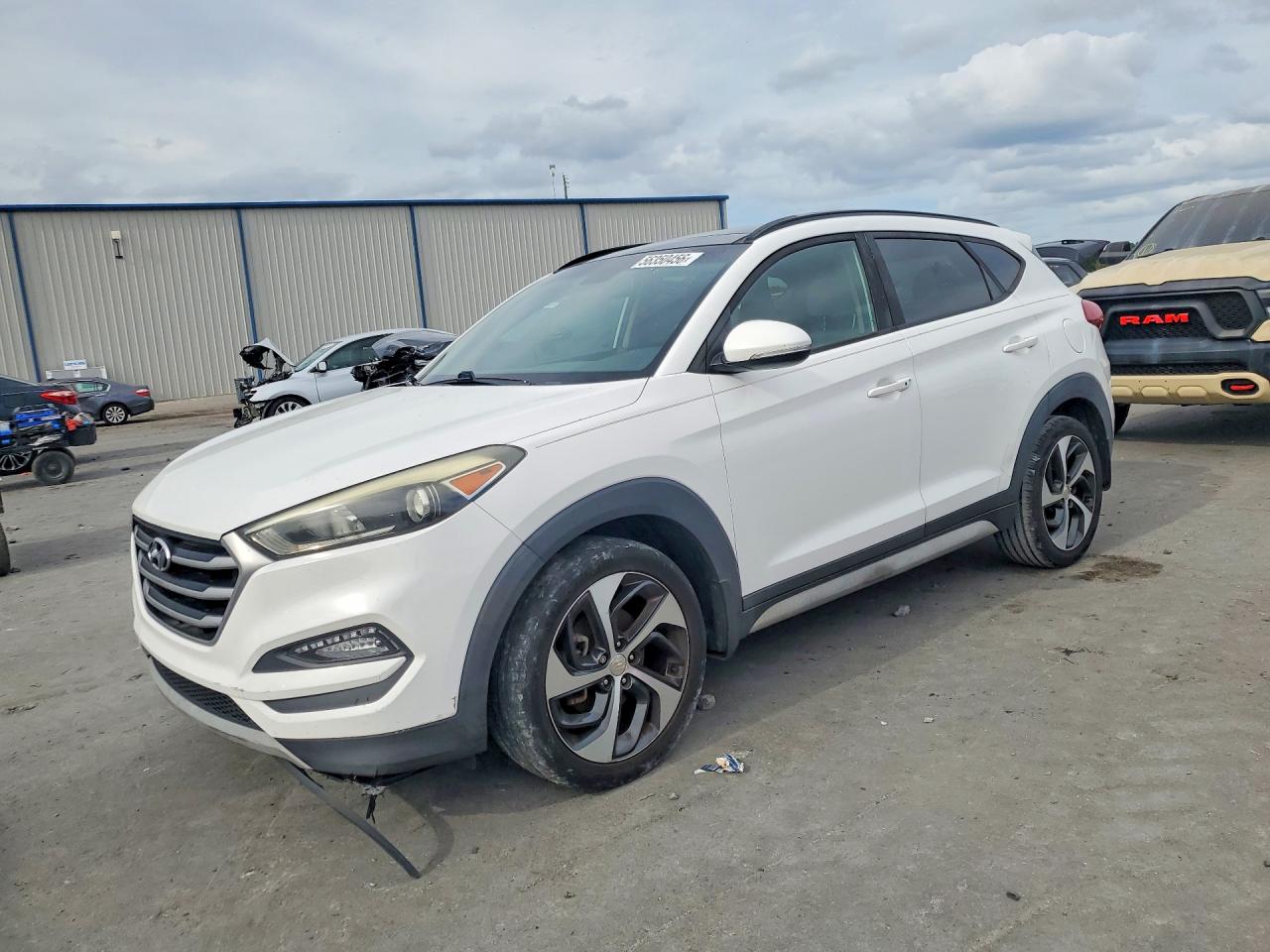 2018 Hyundai Tucson Value, VIN KM8J33A27JU670065 — Side