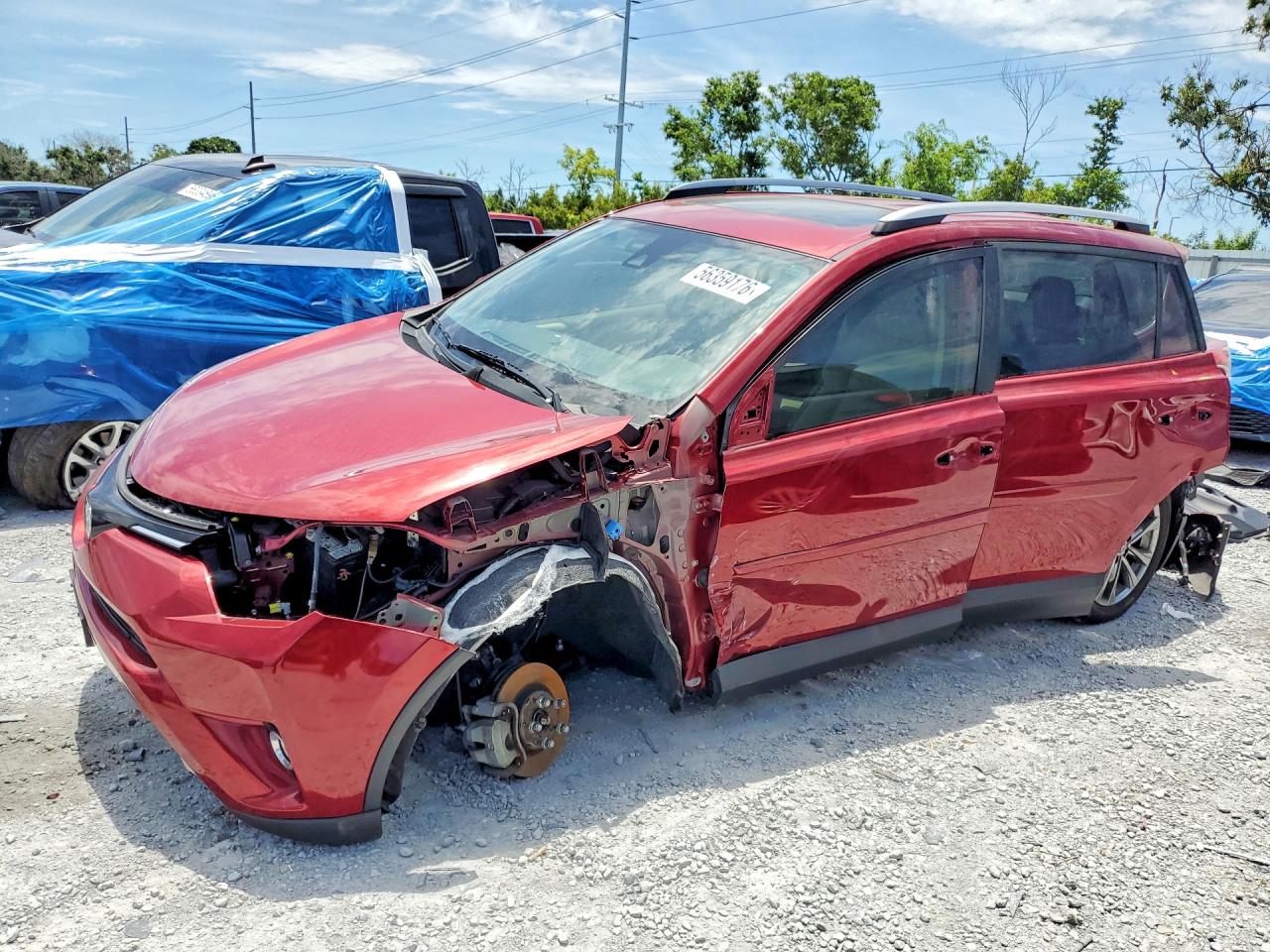 2018 Toyota RAV4 Limited, VIN JTMDFREV0JD242094 — Front end