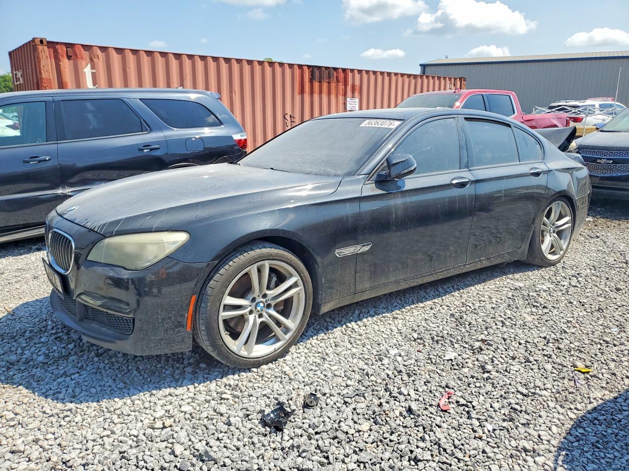 2013 BMW 7 Series 740i, VIN WBAYA6C55DD143709 — Rear end