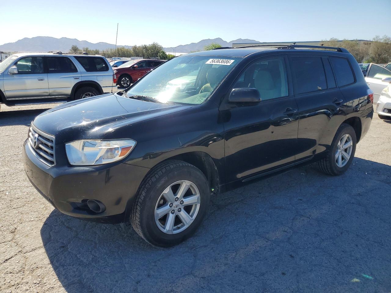 2010 Toyota Highlander, VIN 5TDBK3EH2AS029131 — Side