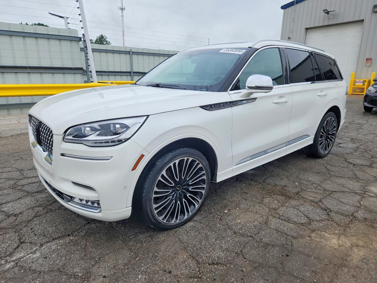 2021 Lincoln Aviator Black Label, VIN 5LM5J9XC2MGL02631 — Hail