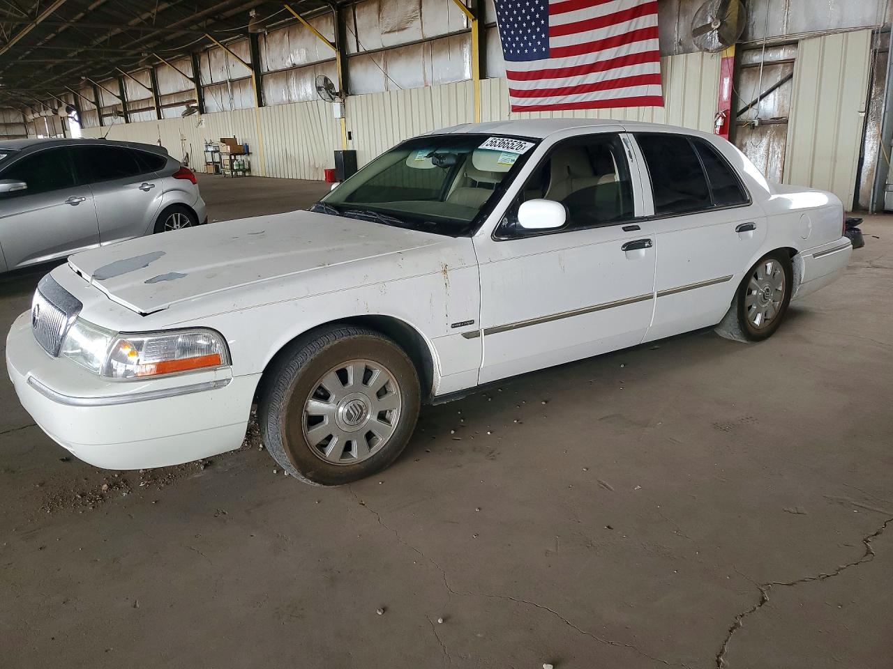 2005 Mercury Grand Marquis LS Premium, VIN 2MEFM75W25X632025 — Minor dents and scratches