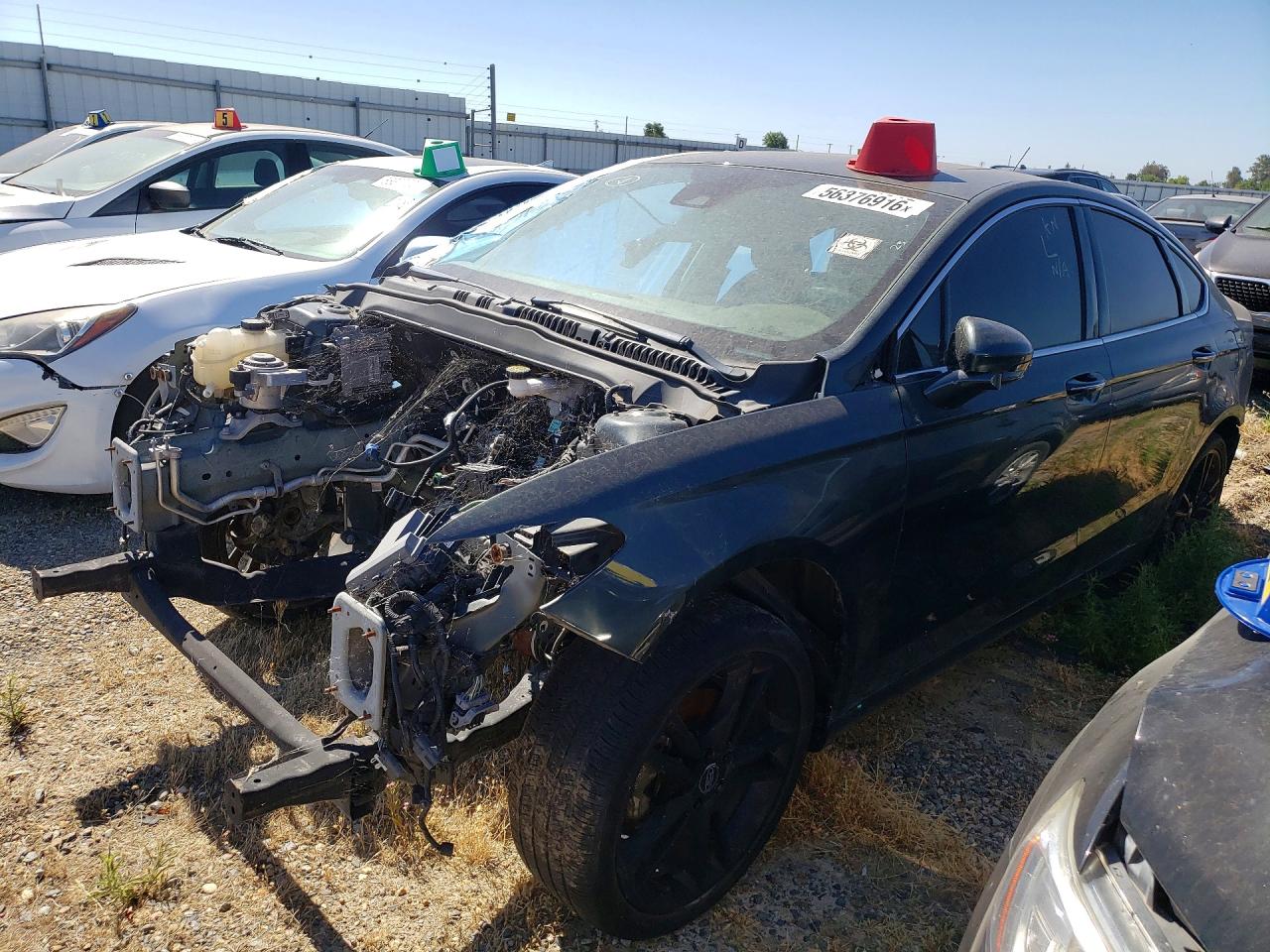 2015 Ford Fusion Titanium, VIN 3FA6P0K91FR137562 — Stripped