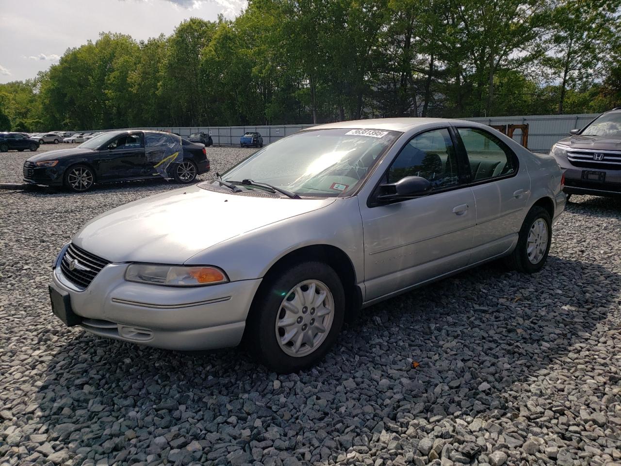 2000 Chrysler Cirrus LX, VIN 1C3EJ46X9YN214437 — Normal wear