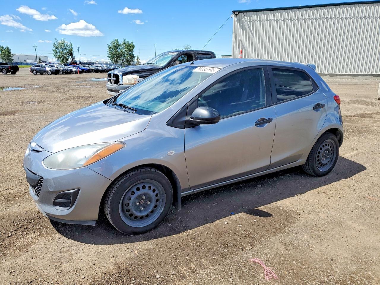 2014 Mazda 2 Sport, VIN JM1DE1KY3E0189178 — Side