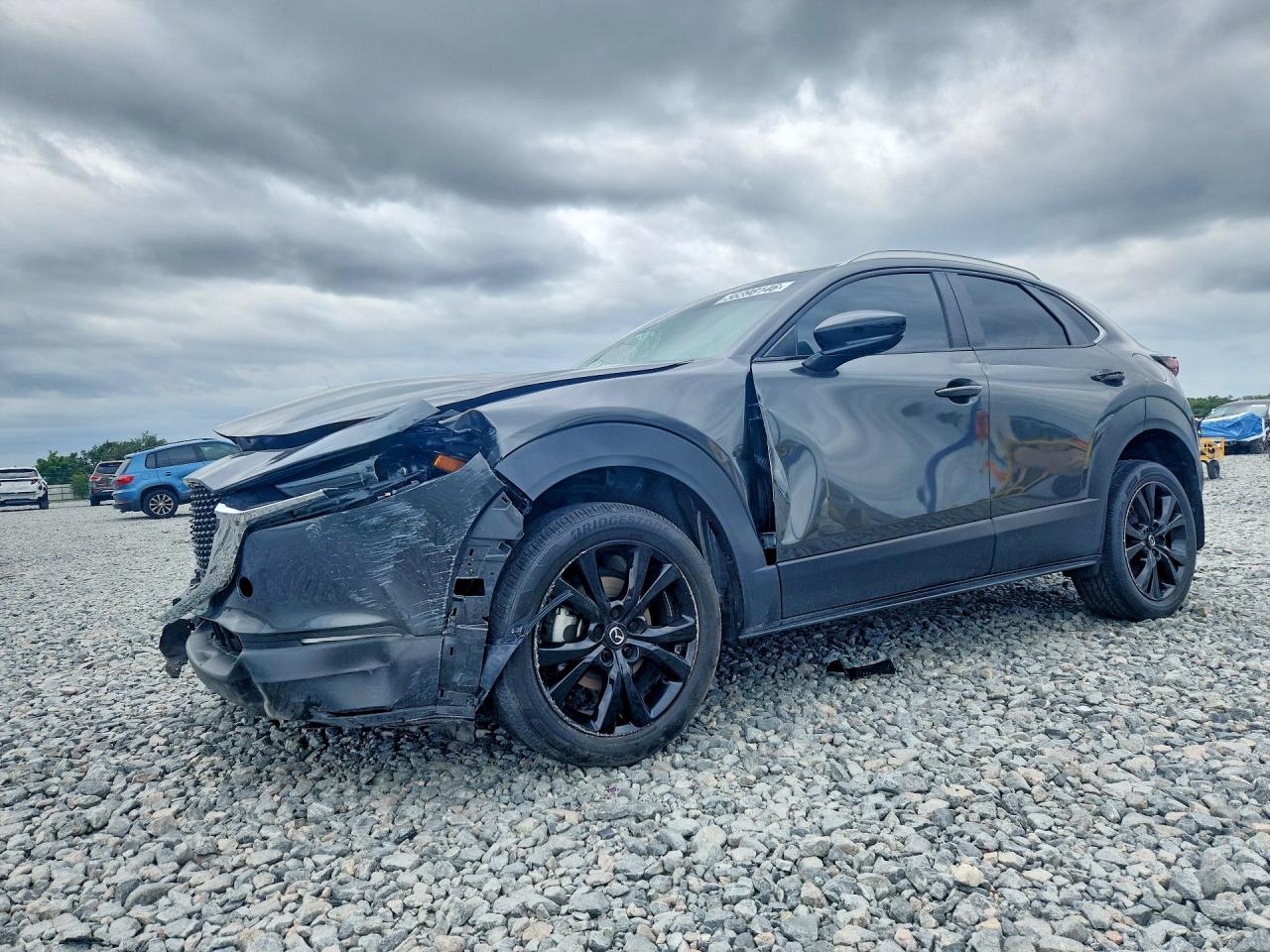 2024 Mazda CX-30 S Select Sport, VIN 3MVDMBBM8RM639396 — Front end