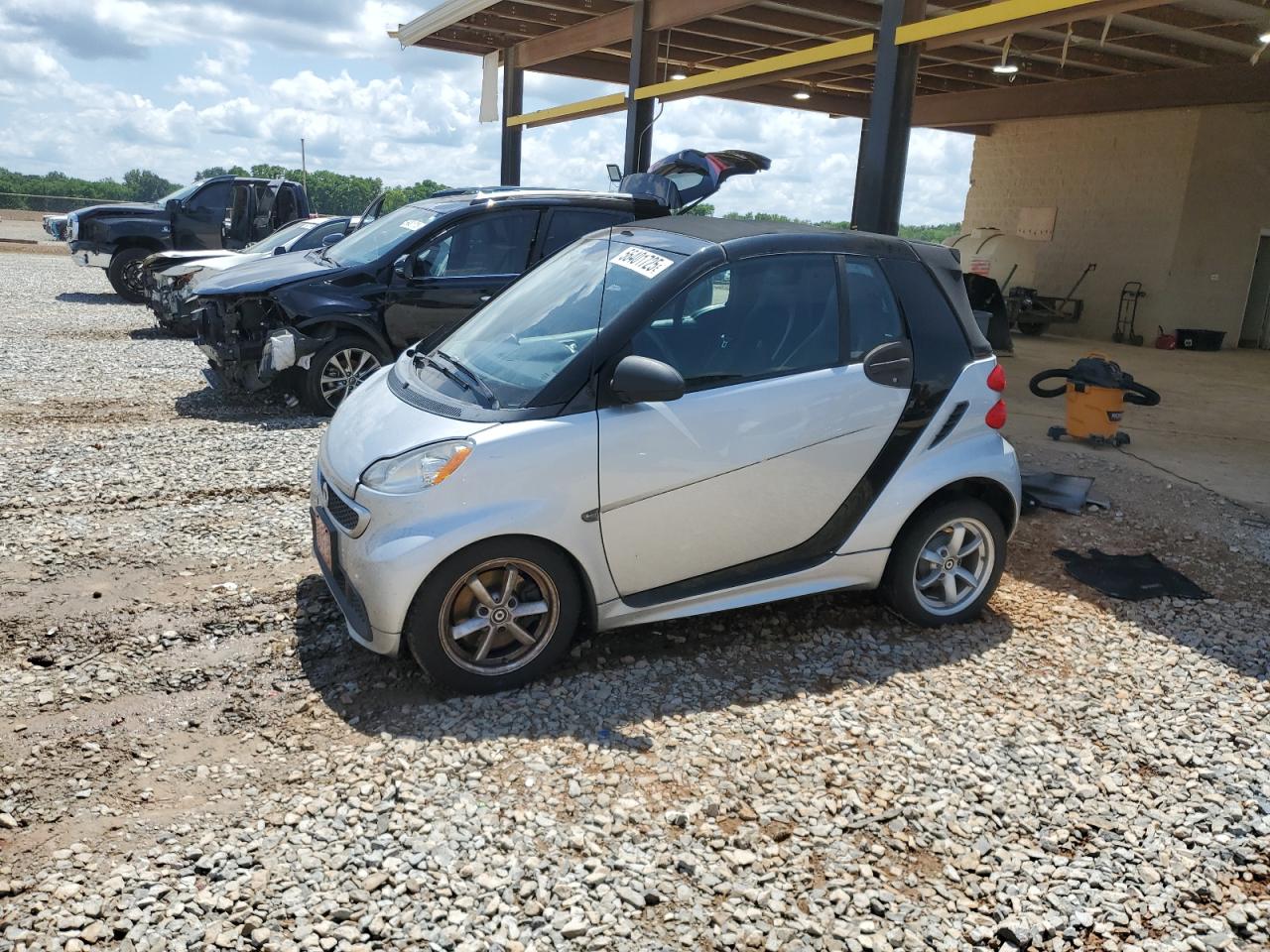2015 Smart fortwo Passion, VIN WMEEK3BA1FK830296 — Side