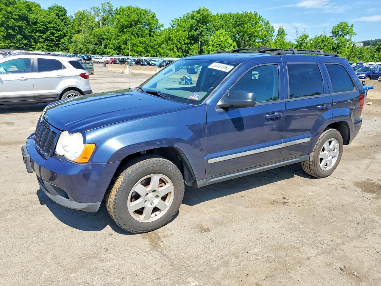 2010 Jeep Grand Cherokee Laredo, VIN 1J4PR4GKXAC150081 — Minor dents and scratches