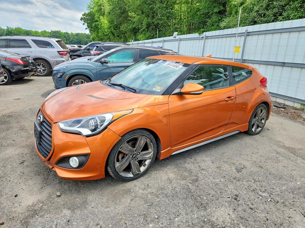 2015 Hyundai Veloster Turbo, VIN KMHTC6AE9FU229016 — Бок