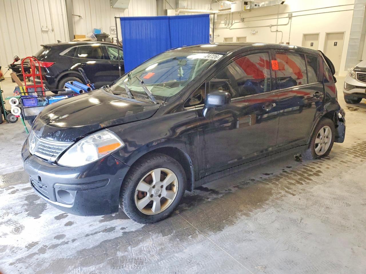 2010 Nissan Versa S, VIN 3N1BC1CP8AL456995 — Зад