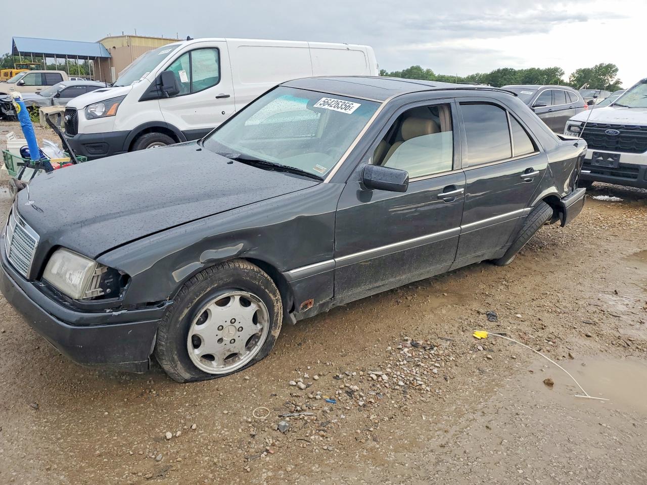 1995 Mercedes-Benz C 2.8L, VIN WDBHA28E9SF141594 — Side