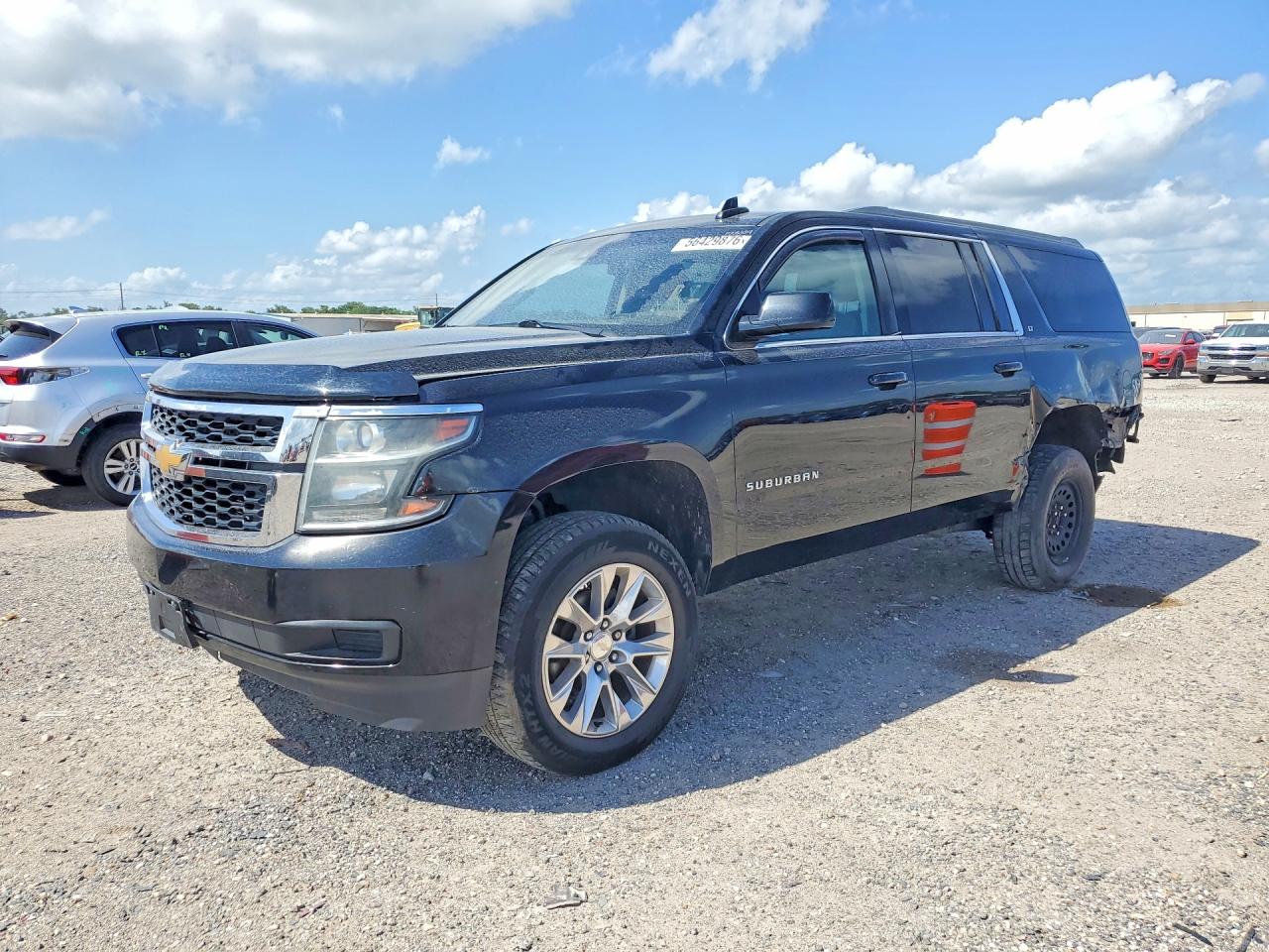 2016 Chevrolet Suburban LT, VIN 1GNSCHKC9GR358510 — Rear end