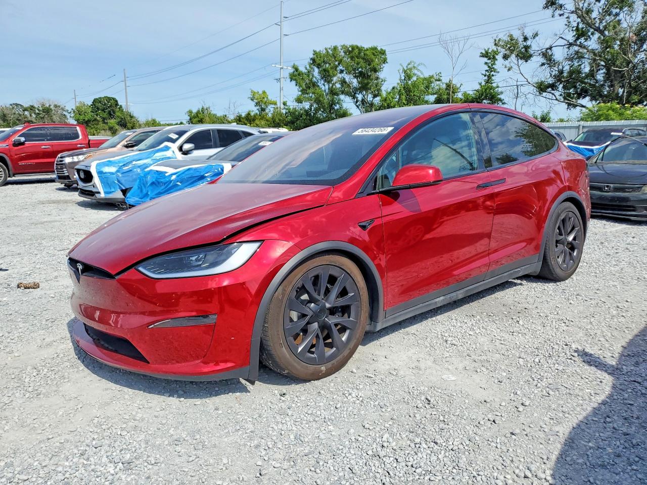 2024 Tesla Model X, VIN 7SAXCDE59RF446540 — Side