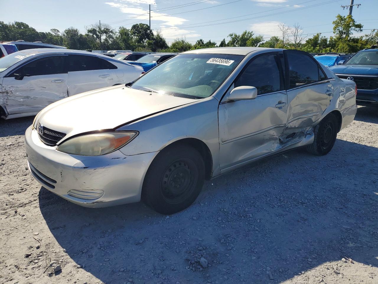2003 Toyota Camry LE, VIN 4T1BE32K83U672990 — Side