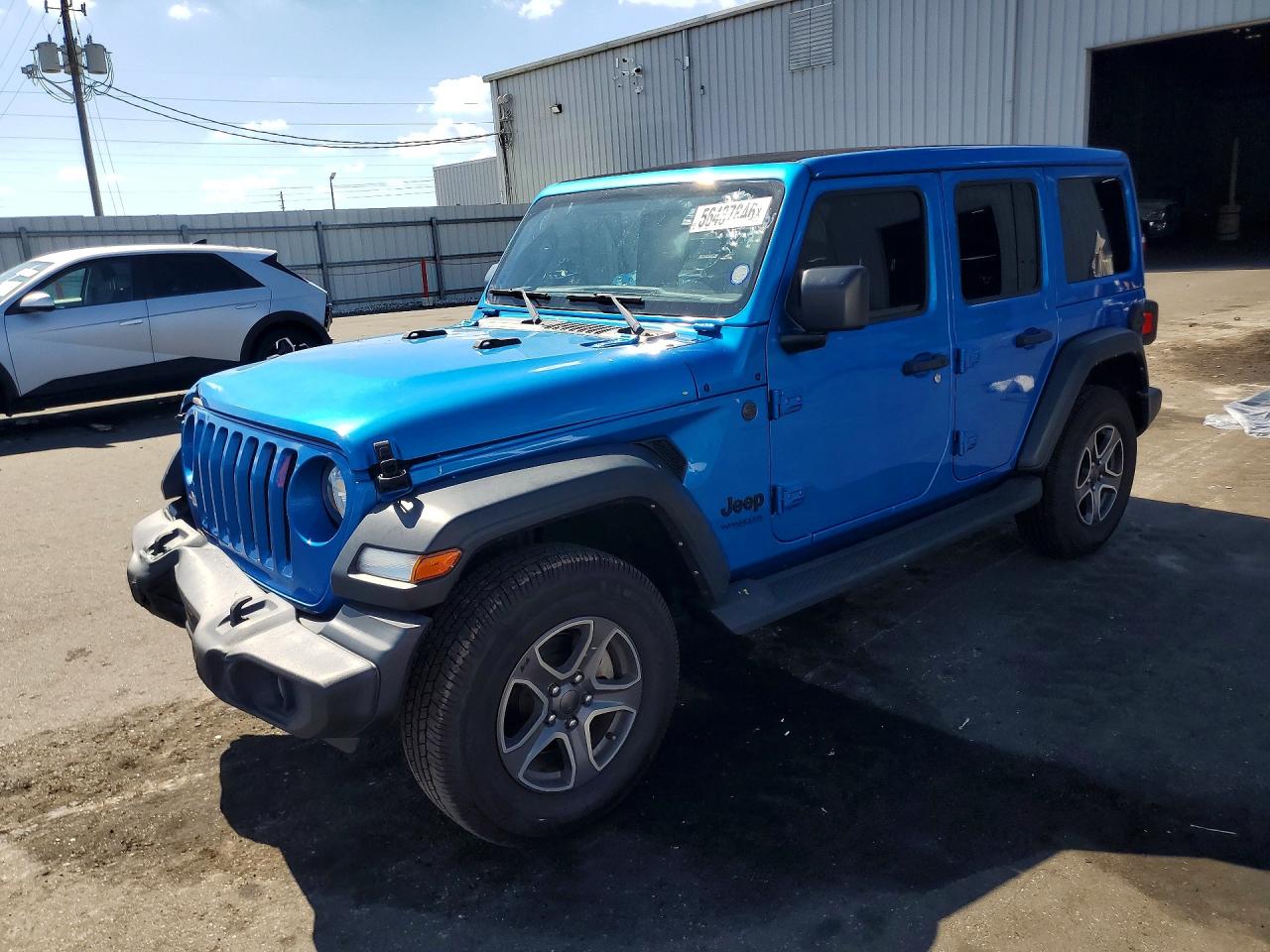 2022 Jeep Wrangler Unlimited Sport, VIN 1C4HJXDN2NW166765 — Front end