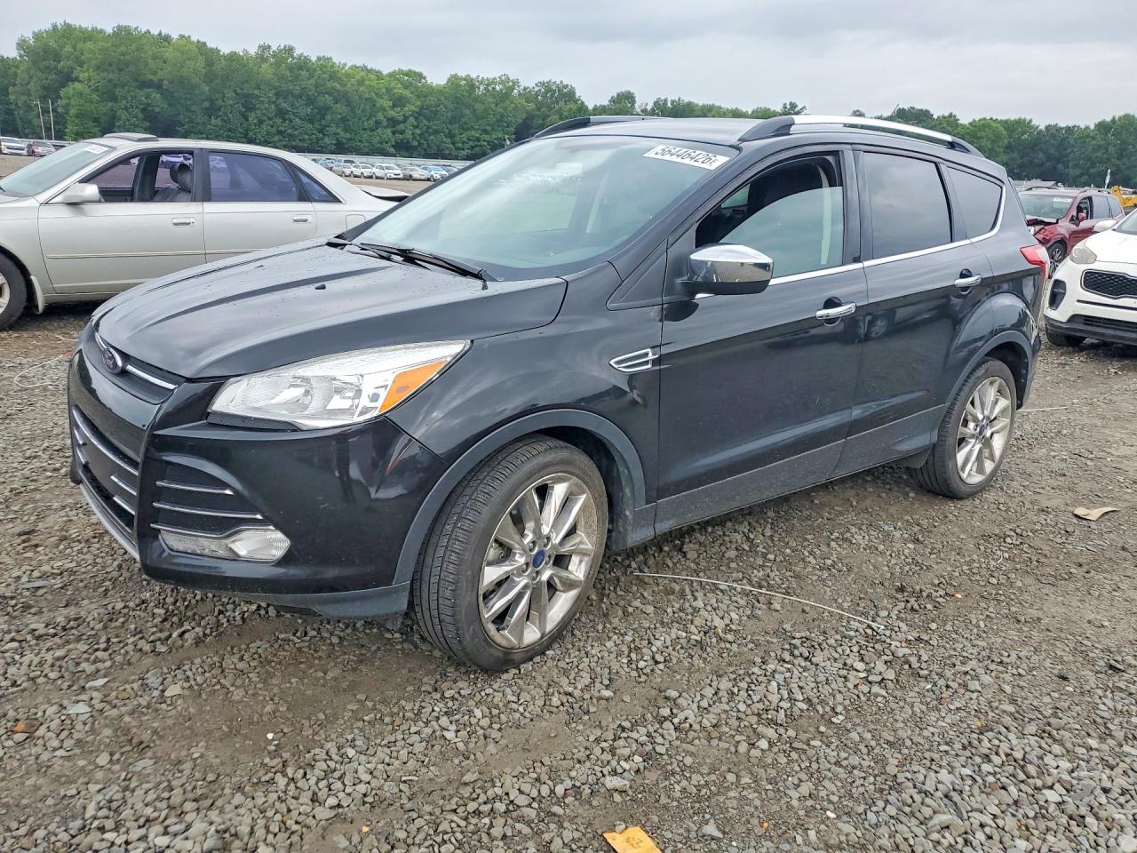2015 Ford Escape SE, VIN 1FMCU0G98FUB56371 — Water / flood