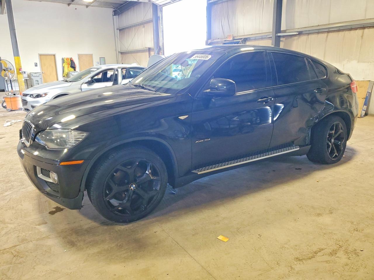 2014 BMW X6 xDrive35i, VIN 5UXFG2C58E0H10619 — Бок