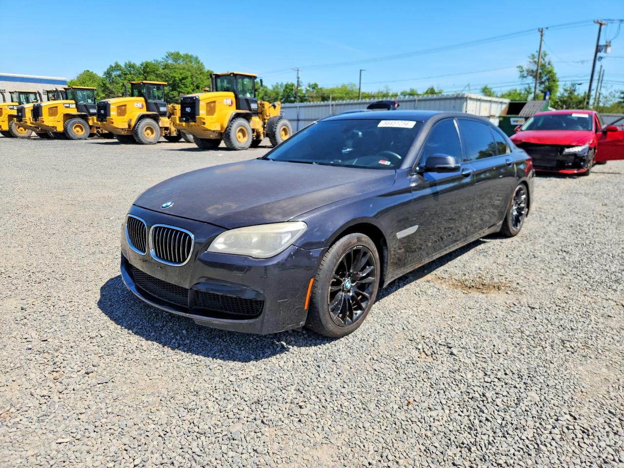 2013 BMW 7 Series 750Li xDrive, VIN WBAYF8C57DDE59077 — Side