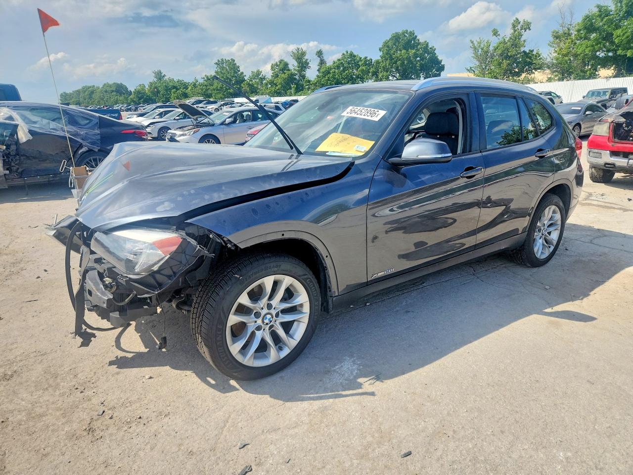 2015 BMW X1 xDrive28i, VIN WBAVL1C58FVY31085 — Front end
