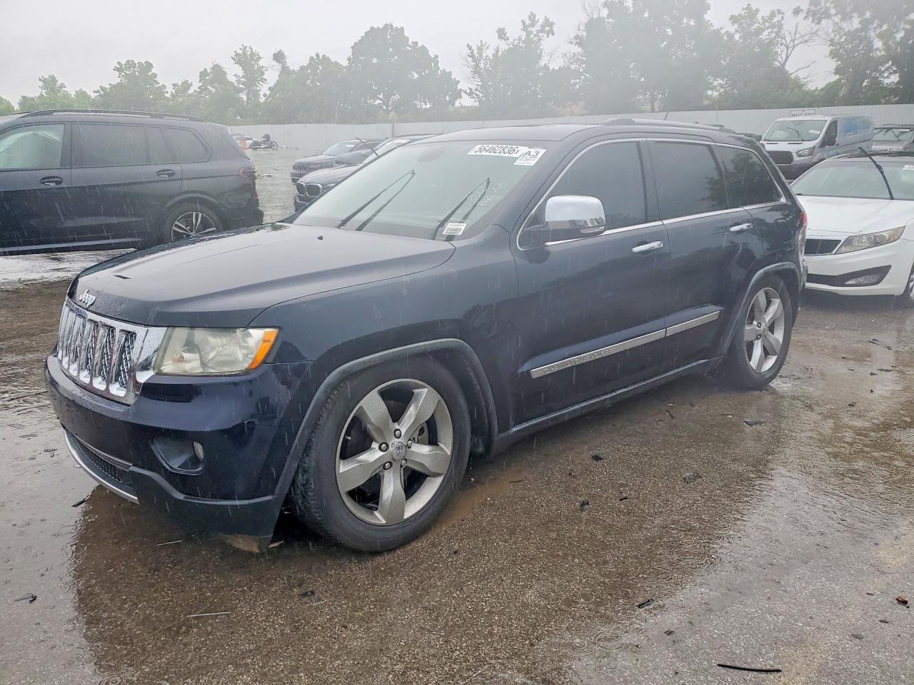 2011 Jeep Grand Cherokee Overland, VIN 1J4RR6GT7BC700917 — Бок