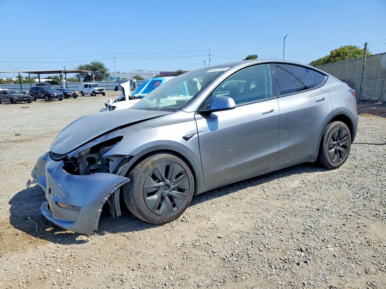 2024 Tesla Model Y, VIN 7SAYGDED6RF210976 — Front end