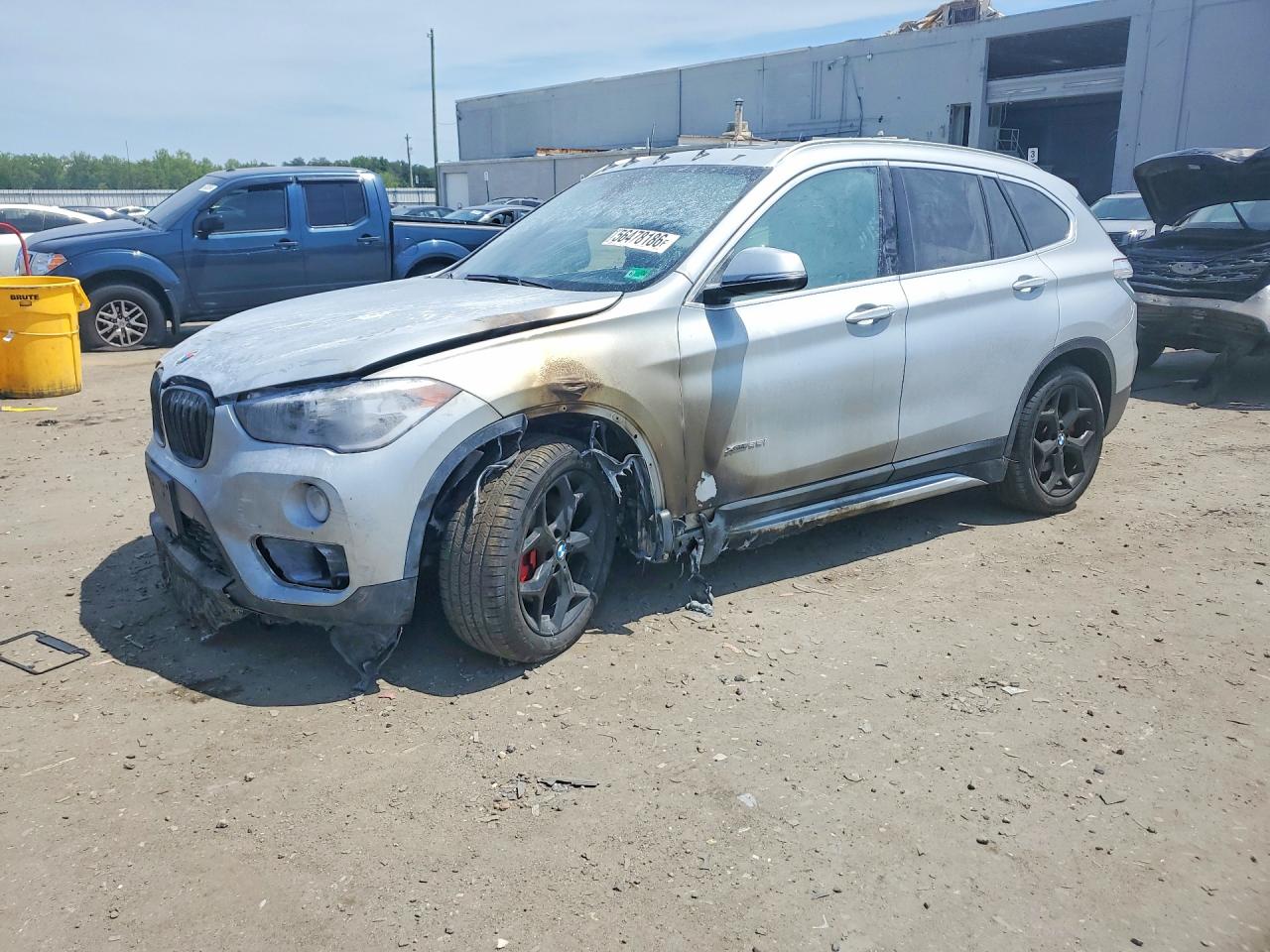 2018 BMW X1 xDrive28i, VIN WBXHT3C36J5K22051 — Engine fire