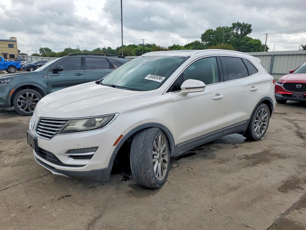 2015 Lincoln MKC, VIN 5LMCJ1A96FUJ03804 — Undercarriage